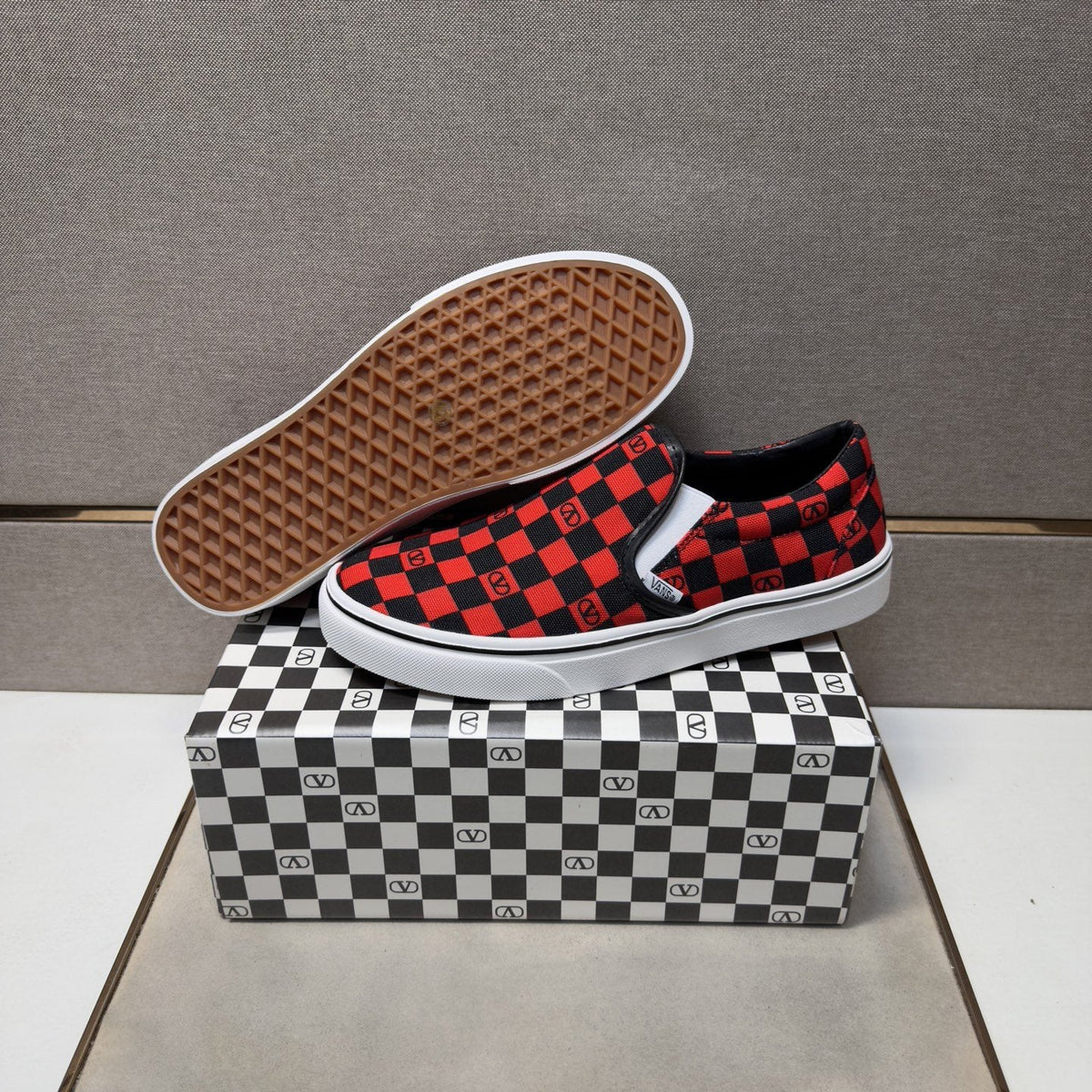 Vans Red and Black Checkerboard Slip-On Sneakers — detail