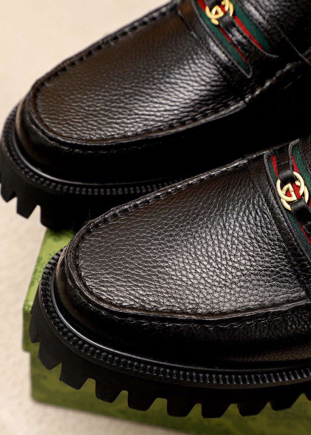 GUCCI Black Lug-Sole Loafers — detail