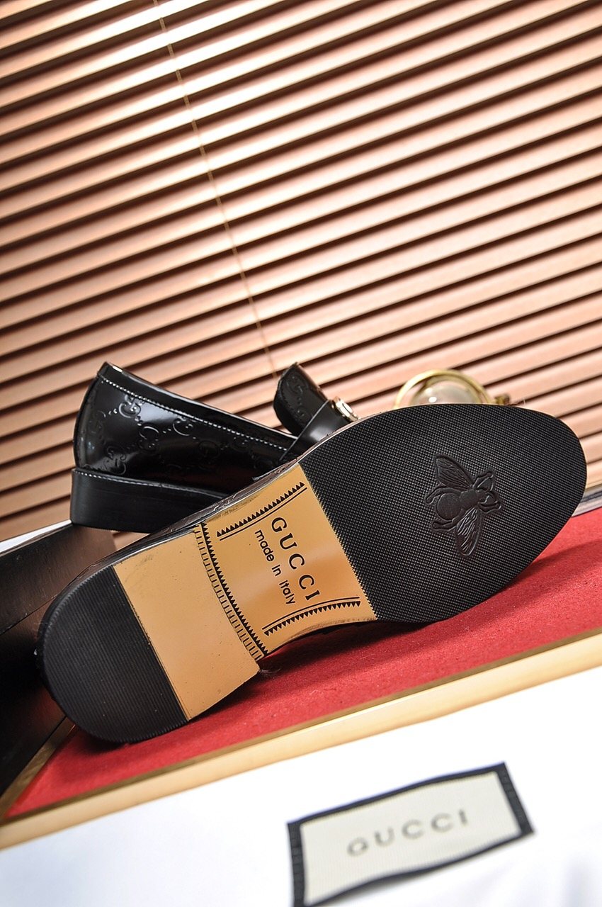 Gucci Buckle Loafers — side