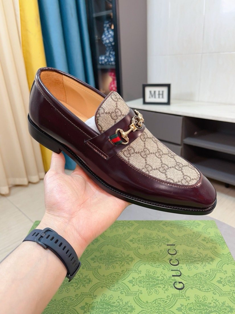 Gucci Monogram Metal Bit Loafers — model